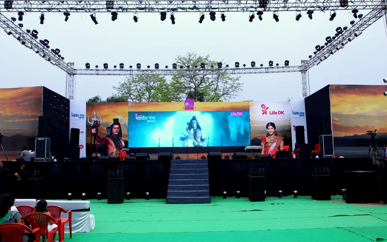 Open-air festival stage with LED wall and lighting truss in Varanasi